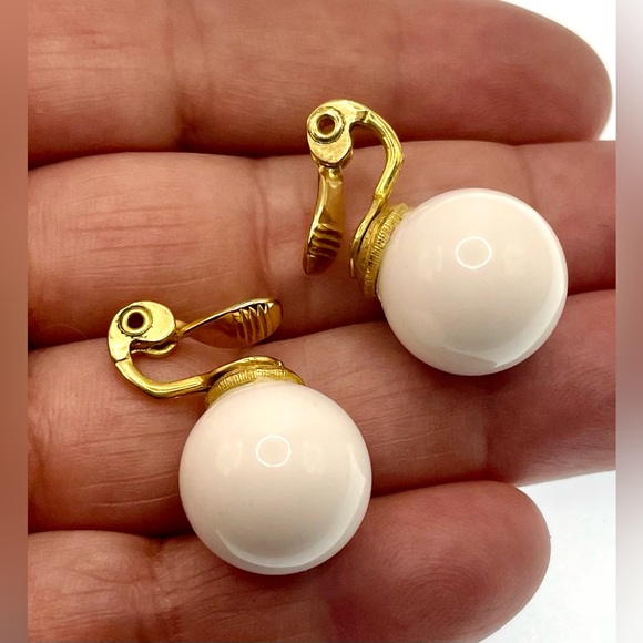 Vintage Signed Monet Gold Tone White
Lucite Ball Clip On Earrings - Picture 8 of 9